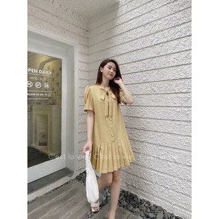 Váy vàng chanh cổ nơ cúc ngọc tiểu thư