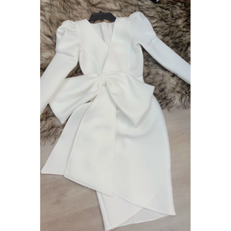 Đầm du tiêc body tay dài vat xéo nơ to  anh thât