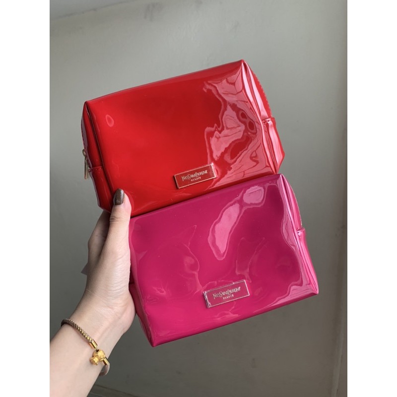 Túi / Bóp đựng mỹ phẩm YSL nền đỏ , hồng