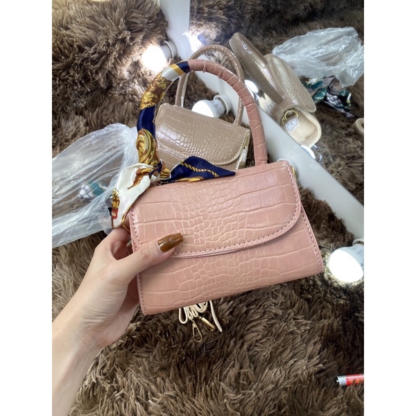 Túi đeo chéo cầm tay mini