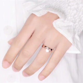 Nhẫn titan ko đEn cách điệu trái tim NT021