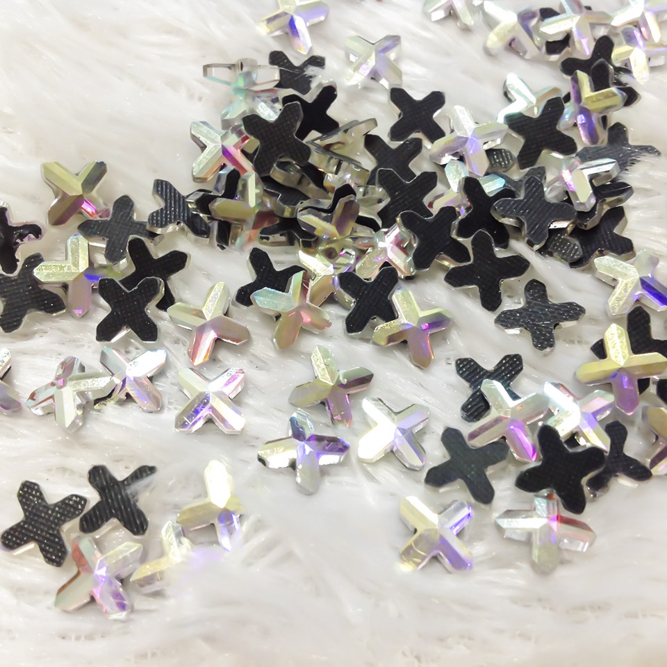 Đá ủi nhiệt hình ngôi sao 4 cánh, hạt đá ủi áo đầm ngôi sao ánh 7 màu hat hong kong siêu đẹp