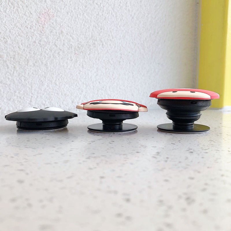 Giá đỡ điện thoại bằng silicon họa tiết hoạt hình dễ thương