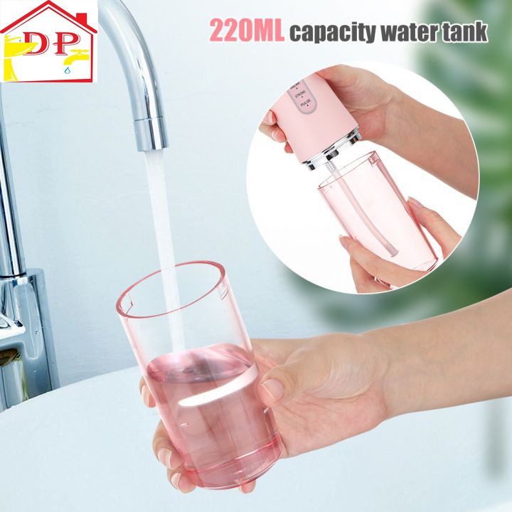 Máy tăm nước vệ sinh răng miệng siêu sạch cầm tay chính hãng theo công nghệ Châu Âu Oral Irrigator tặng kèm 4 đầu phun