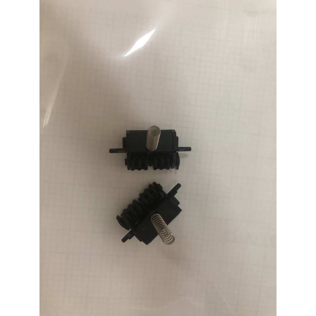 Bộ 2 con lăn ra giấy máy in Canon 3300 HP 2015d 2015dn 1320