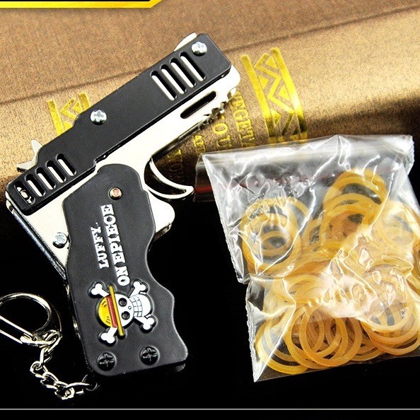 Súng bắn dây thun móc chìa khoá dạng đồ chơi gấp gọn cho trẻ em tặng kèm bia và dây chun M1