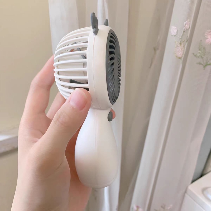 Quạt mini cầm tay, quạt cầm tay mini có đế để bàn , nhỏ gọn, tiện lợi (Tặng Dây Sạc+ kèm dây cao su)