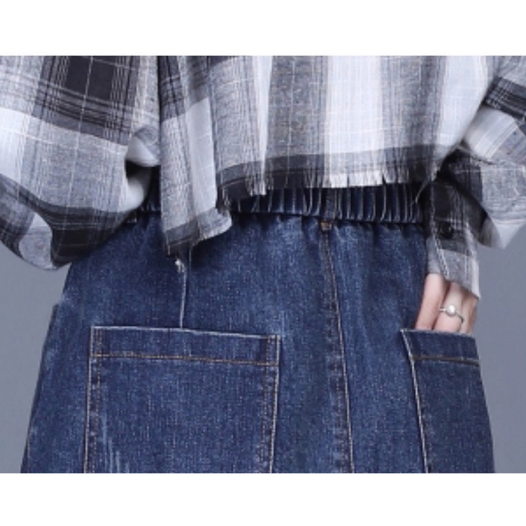 Chân váy jean  dài ngang gối dáng chữ a lưng cao xẻ tà phối vạt cúc lệch trẻ trung sành điệu