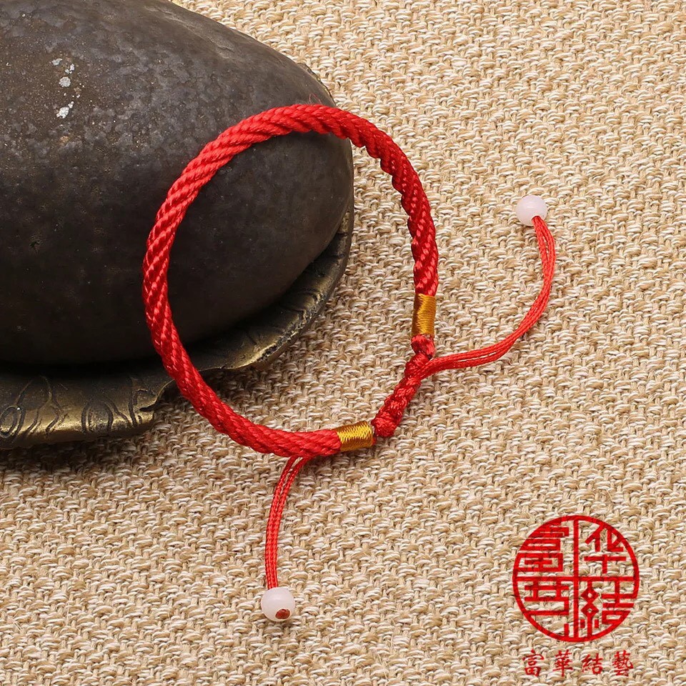 VÒNG ĐEO DÂY ĐỎ TRƠN ĐÍNH 2 HẠT NGỌC ĐẦU DÂY V131 PHONG THỦY | BigBuy360 - bigbuy360.vn