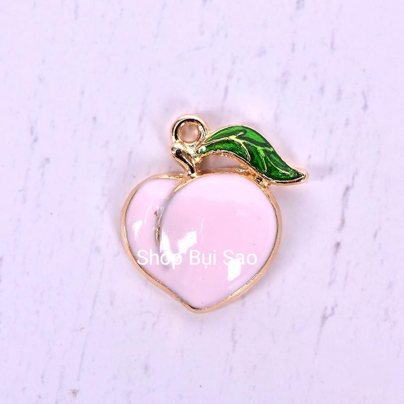 Charm kim loại tráng men hình quả đào màu hồng