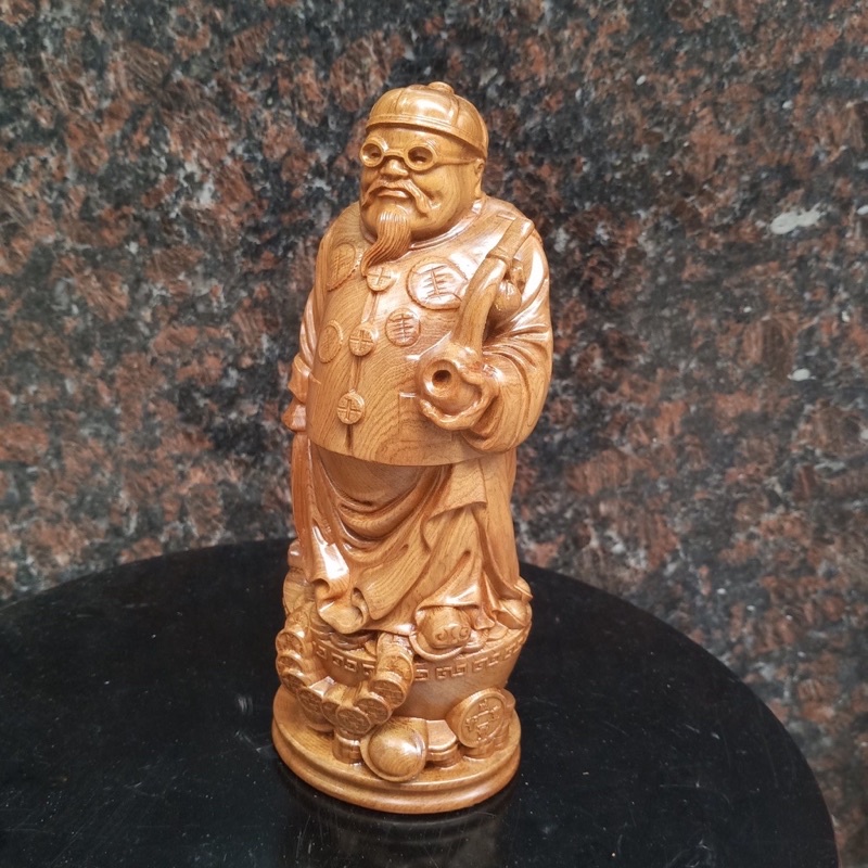 tượng ông quản gia gỗ bach xanh