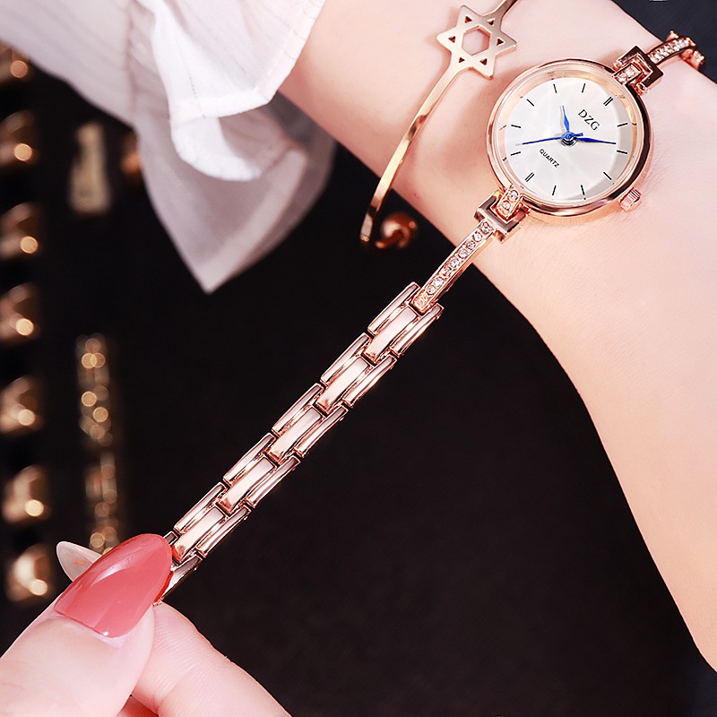 Đồng hồ nữ lắc DZG DL01 cực đẹp, chính hãng, mặt vạch kim xanh tuyệt đẹp, kính mineral chống xước tốt