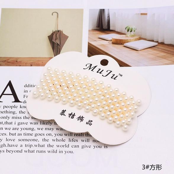 Kẹp tóc đính hạt giả ngọc trai