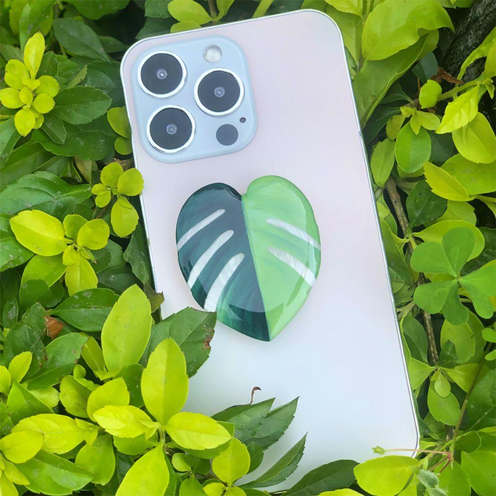 Giá Đỡ Điện Thoại Di Động Cầm Tay Trọng Lượng Nhẹ Hình Chiếc Lá Có Túi Khí Ổn Định Thông Dụng