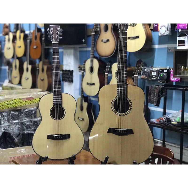 Đàn guitar Acoustic mini. guitar 3/4. Có thể dùng được cả tay phải và tay trái.