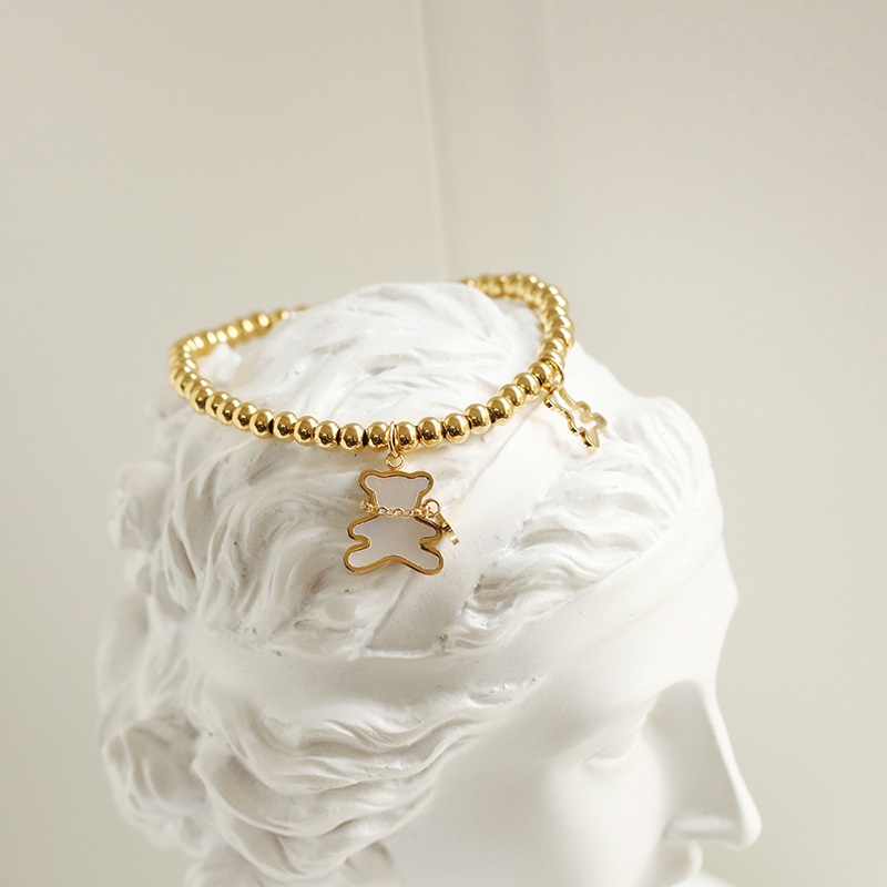 Vòng tay titan chuỗi bi tròn phối mặt gấu cẩm xà cừ không gỉ WB2201