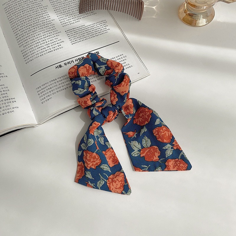 Dây buộc tóc WE FLOWER co giãn thiết kế thắt nơ vải họa tiết hoa nhiều màu sắc xinh xắn tùy chọn dành cho nữ
