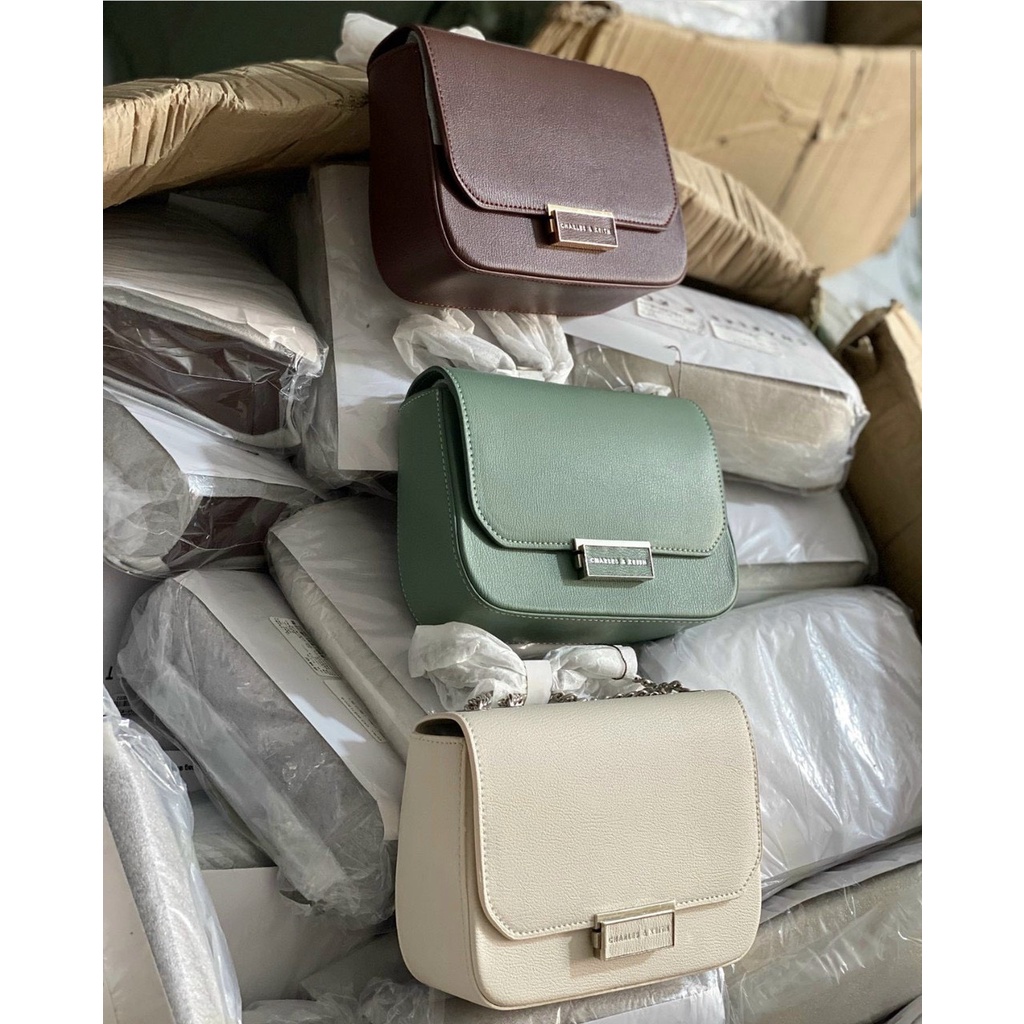 Túi ví đeo vai kẹp nách CNK Push Lock Crossbody Bag mẫu mới ra full đen chuẩn hàng hiệu sang trọng.00