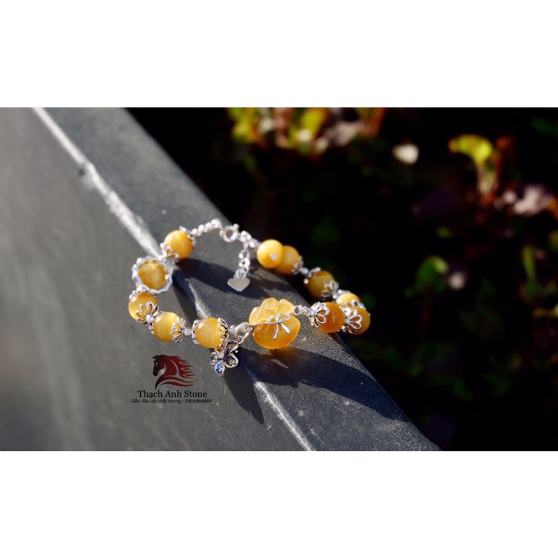 vòng tay túi tiền thach anh mat ho mix charm