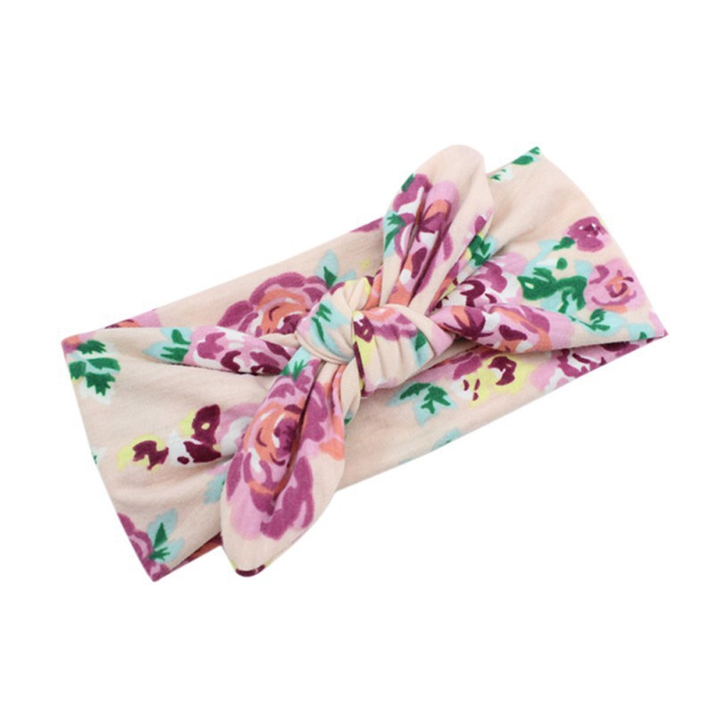 Băng đô vải đính nơ họa tiết hoa đáng yêu dành cho bé