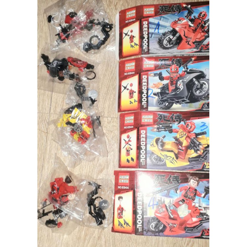 Lắp ráp 1 hộp Lego_Deedpool 6944 có nhiều chi tiết bằng nhựa rất đẹp