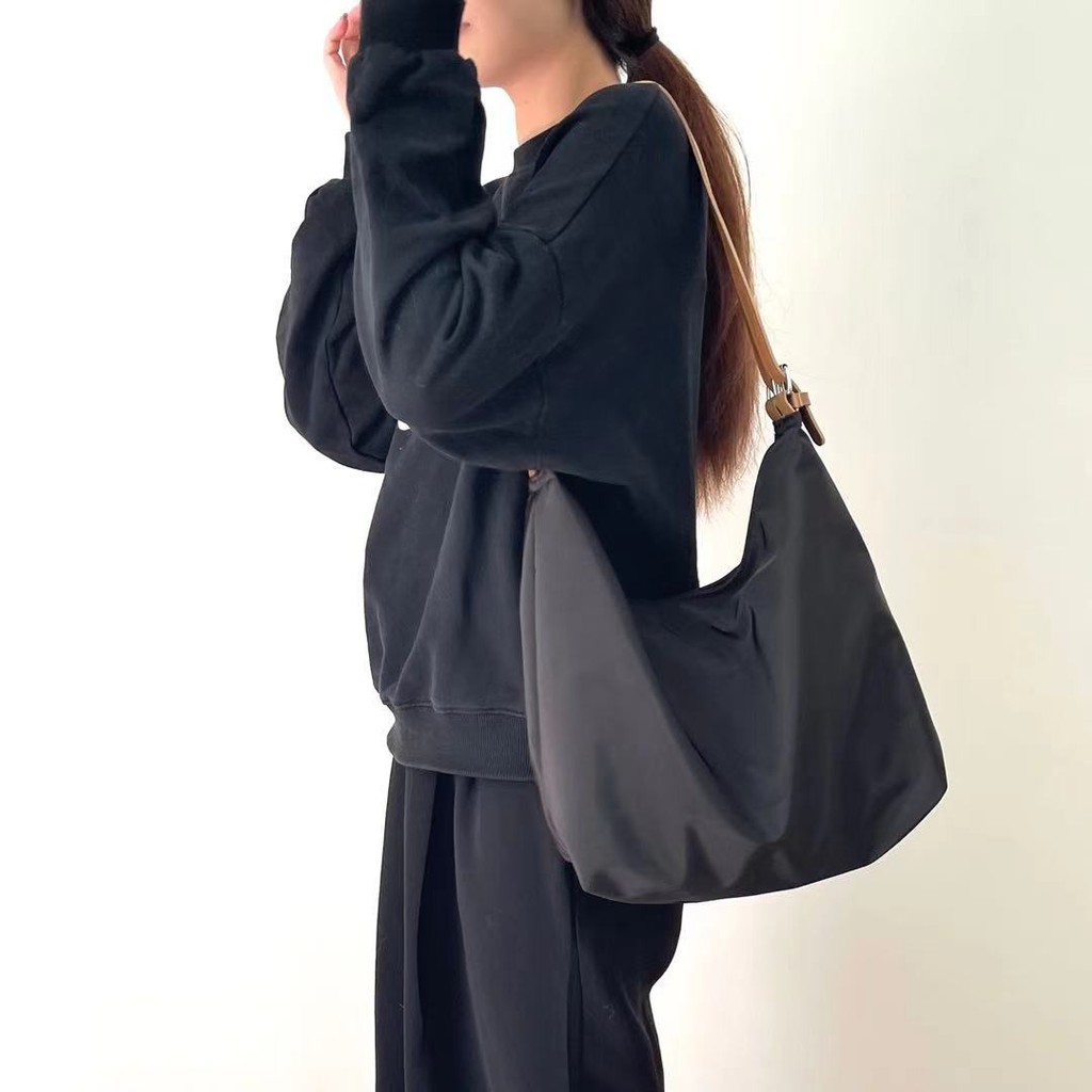 Túi đeo chéo một bên vai làm từ vải oxford thời trang cho nữ