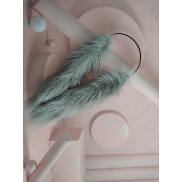 Tai thỏ cụp kèm đuôi