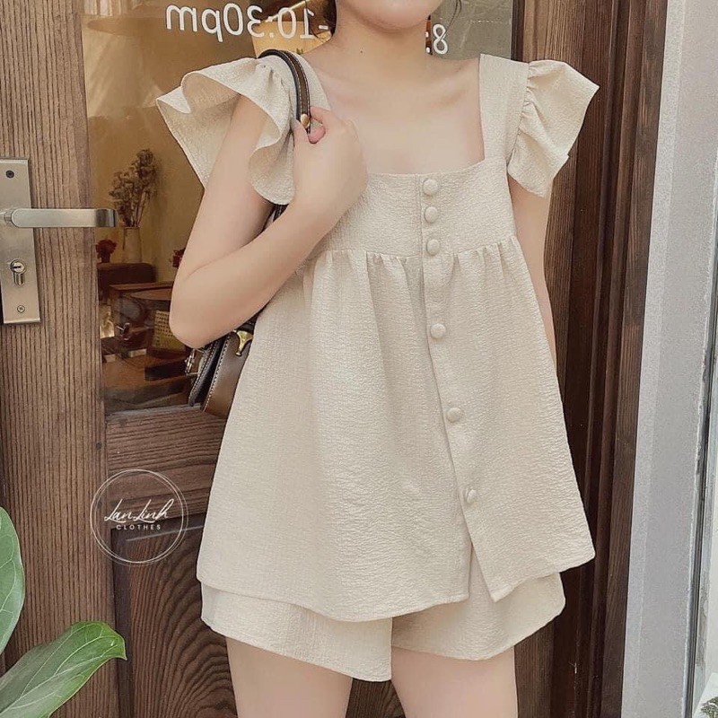 Bộ đũi xốp lớp khuy bọc dọc áo siêu ngon, tay cánh tiên mềm mát mịn thoáng tự do tung tăng dơ tay mà không lo bay mùi