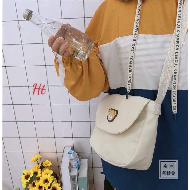 Túi khuy lô gô nắp gấu HT12