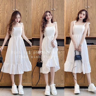Đầm 2 dây cột nơ vải đũi cao cấp chất mịn và mát.