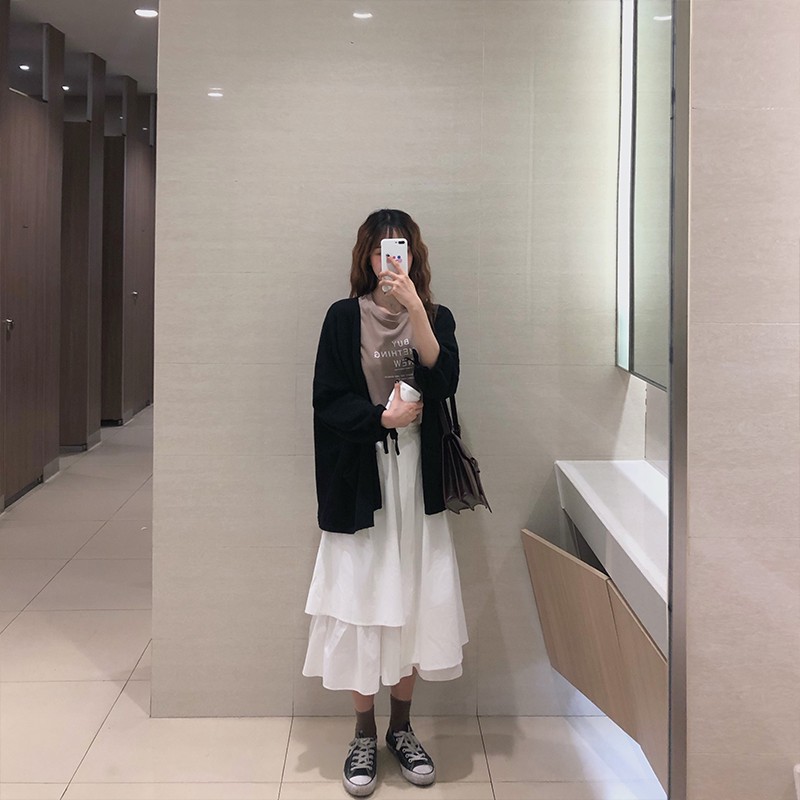 Chân váy dáng xòe kiểu vạt lệch ulzzang 2 màu trắng đen cực xinh | BigBuy360 - bigbuy360.vn