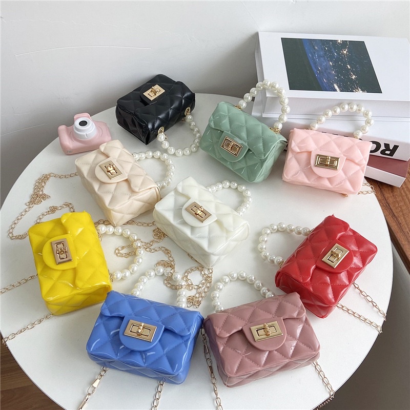 Túi xách đeo chéo mini quai ngọc cho bé gái