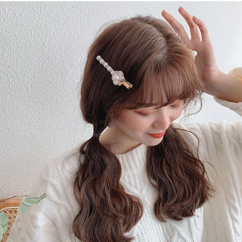 Kẹp tóc một bên đính ngọc trai nhân tạo thời trang 2021