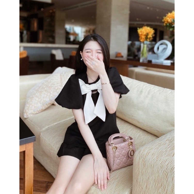 Set quần giả váy xếp ly kết hợp áo tay bồng phối nơ