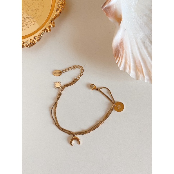 Lắc tay titanium mạ vàng 18k gắn charm