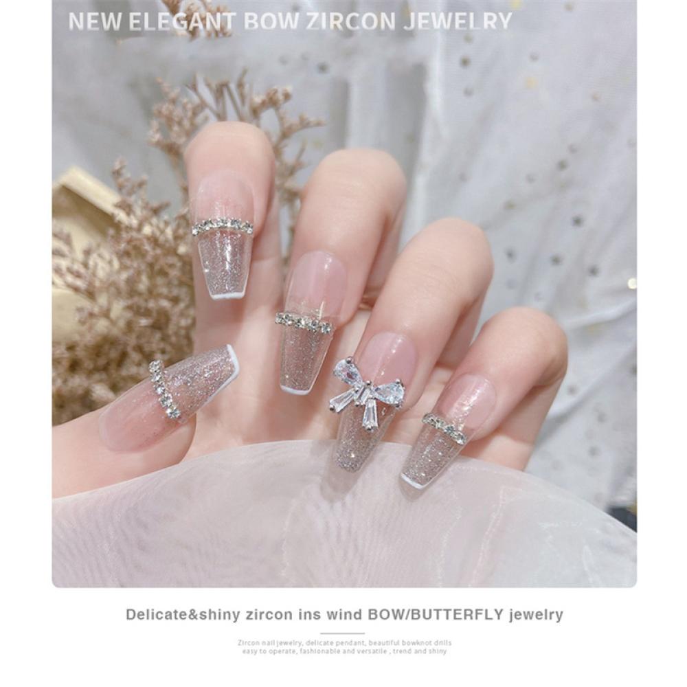 Phụ Kiện Trang Trí Móng Nghệ Thuật Hình Nơ Đính Đá Zircon Màu Bạc Lấp Lánh Thời Trang J4Y3