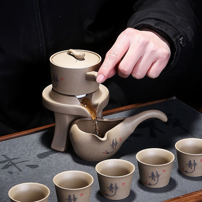 Máy xay đá sáng tạo bán tự động lười chạy khi xoay bộ trà Kung Fu tea infuser, đồ gốm gia dụng