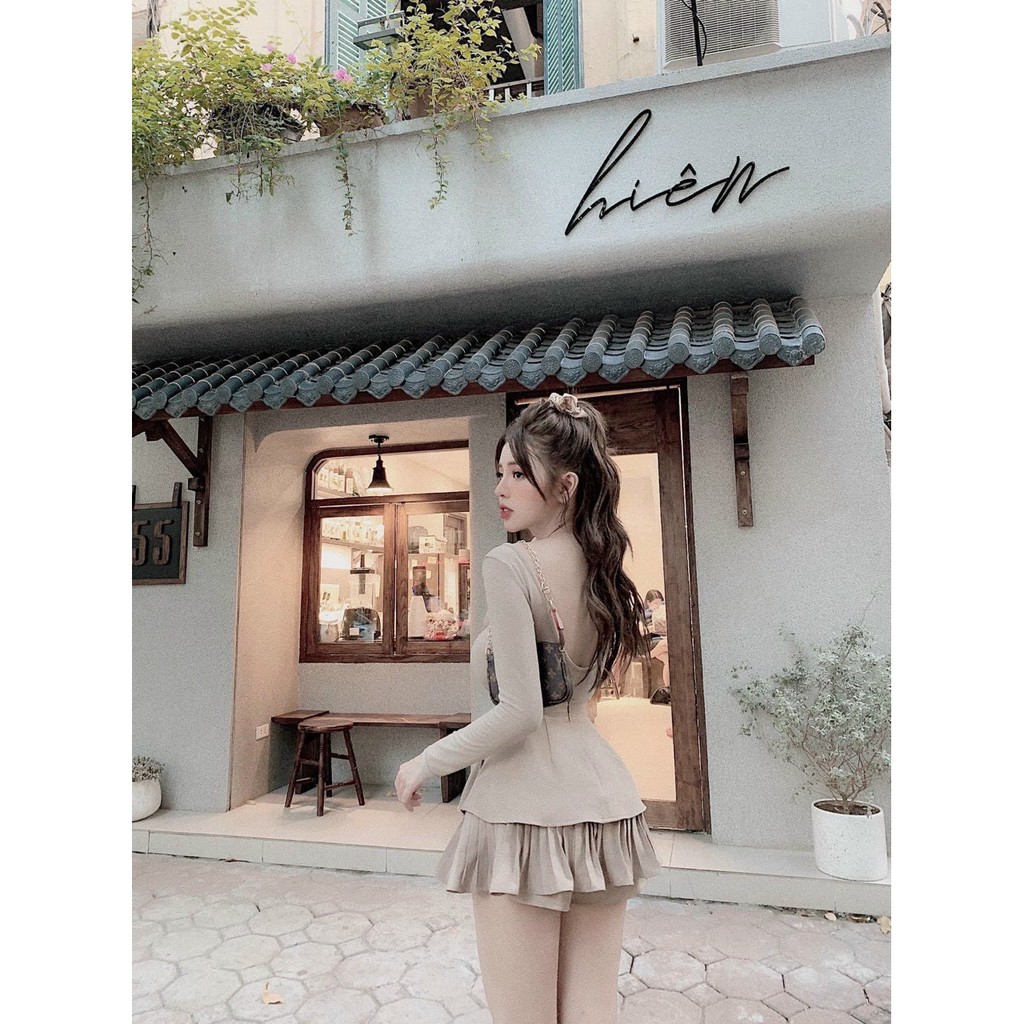 Chân váy xếp ly gấu Mã 330