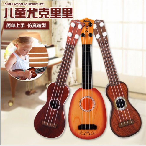 Đàn Guitar mini cho bé - Ukulele nhạc cụ mầm non đồ chơi