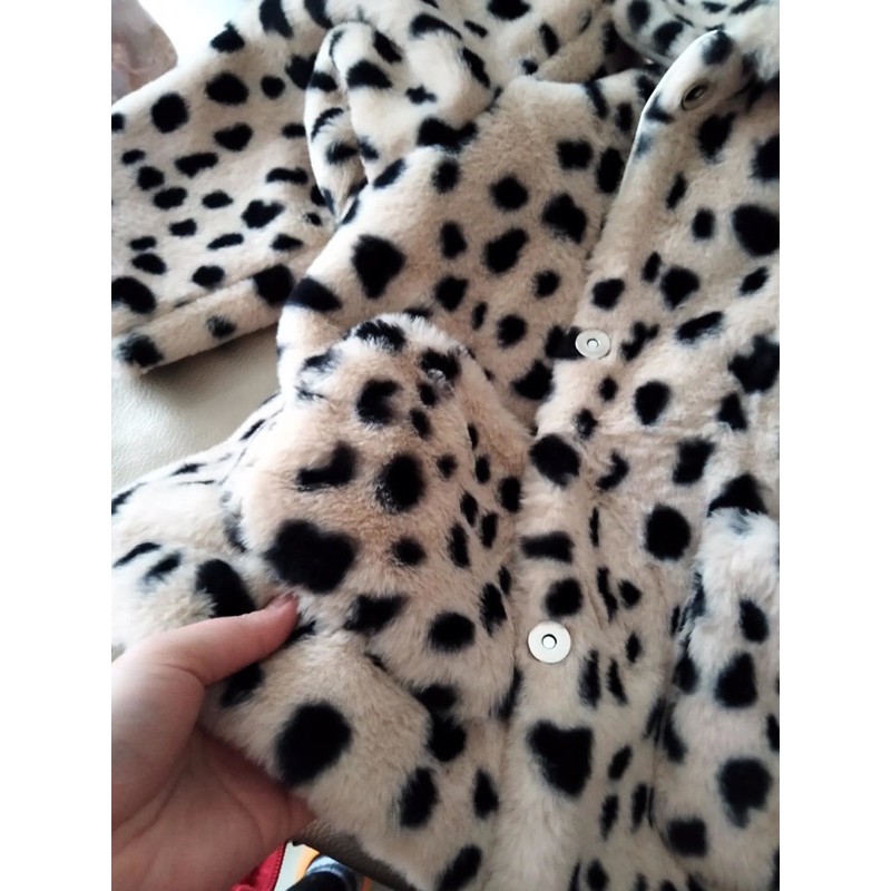 Áo khoác lông giả báo