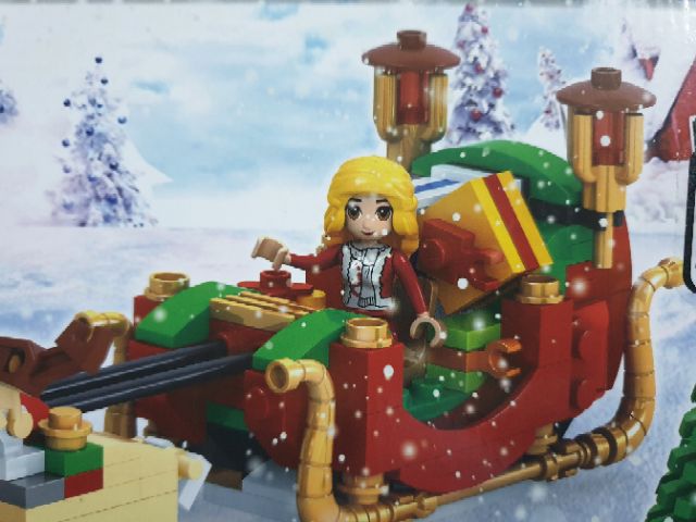 Lego ausini 25526 ông già noel và chiếc xe kéo tuần lộc chở quà tặng giáng sinh cho trẻ em đi trong tuyết rừng thông