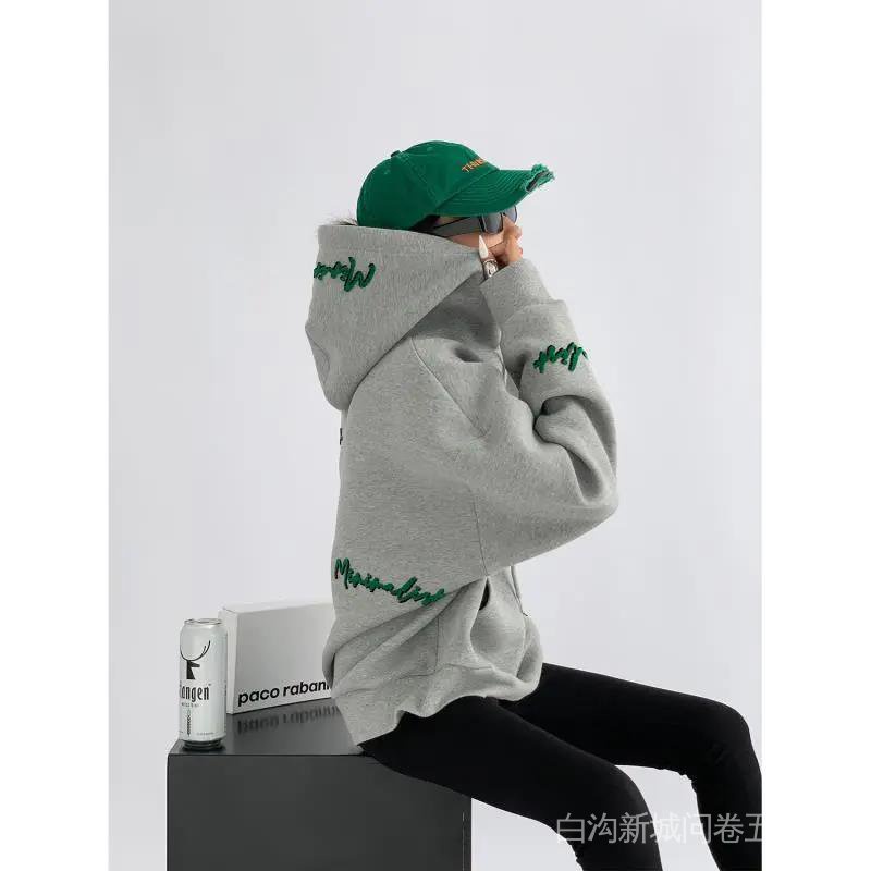 Áo hoodie có mũ trùm đầu dáng rộng tay dài thời trang xuân thu cho nữ