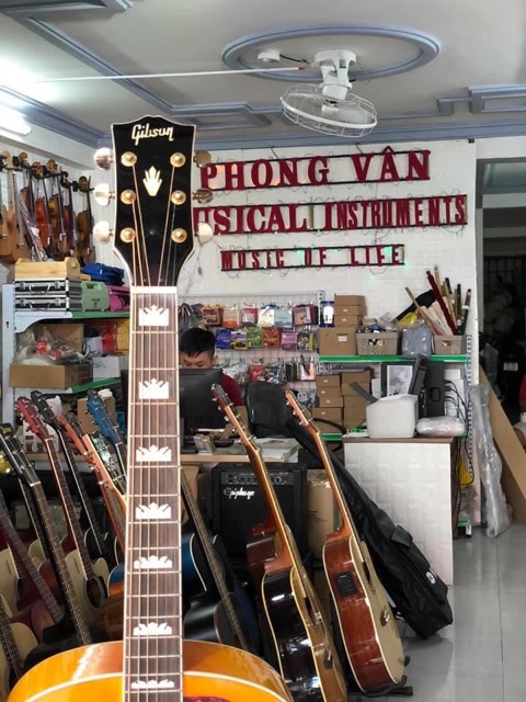 Đàn Guitar Gibson Gỗ Cẩm Ấn ( full phụ kiện)