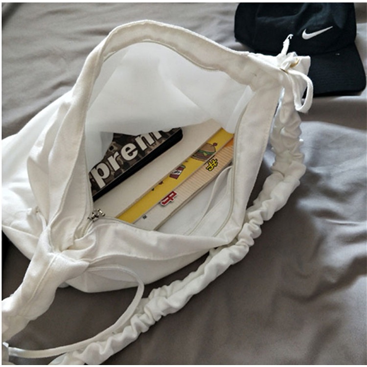 Túi Tote Canvas Đeo Chéo Dây Rút Có Khóa Kéo Ngăn Phụ Thời Trang Nữ Tính Phong Cách Hàn Quốc - Hazis Store