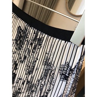 chân váy midi xếp ly họa tiết