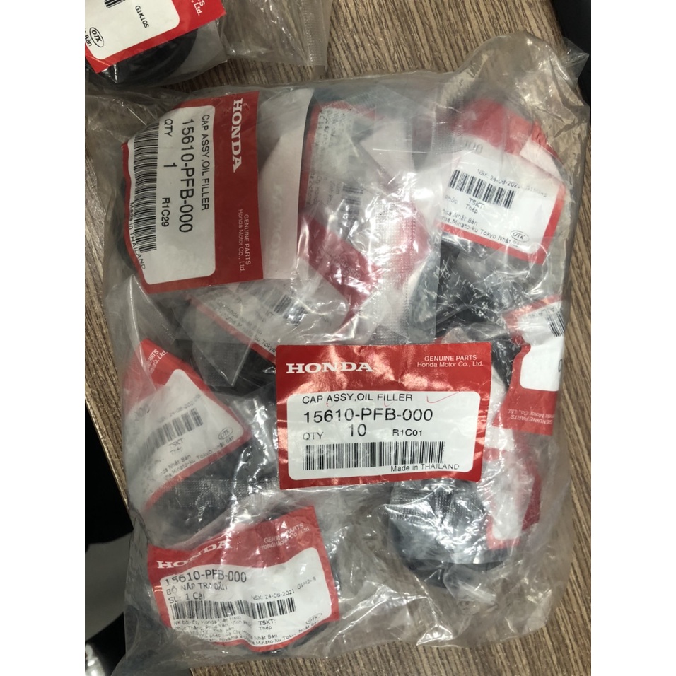 Nắp đổ dầu máy Honda
