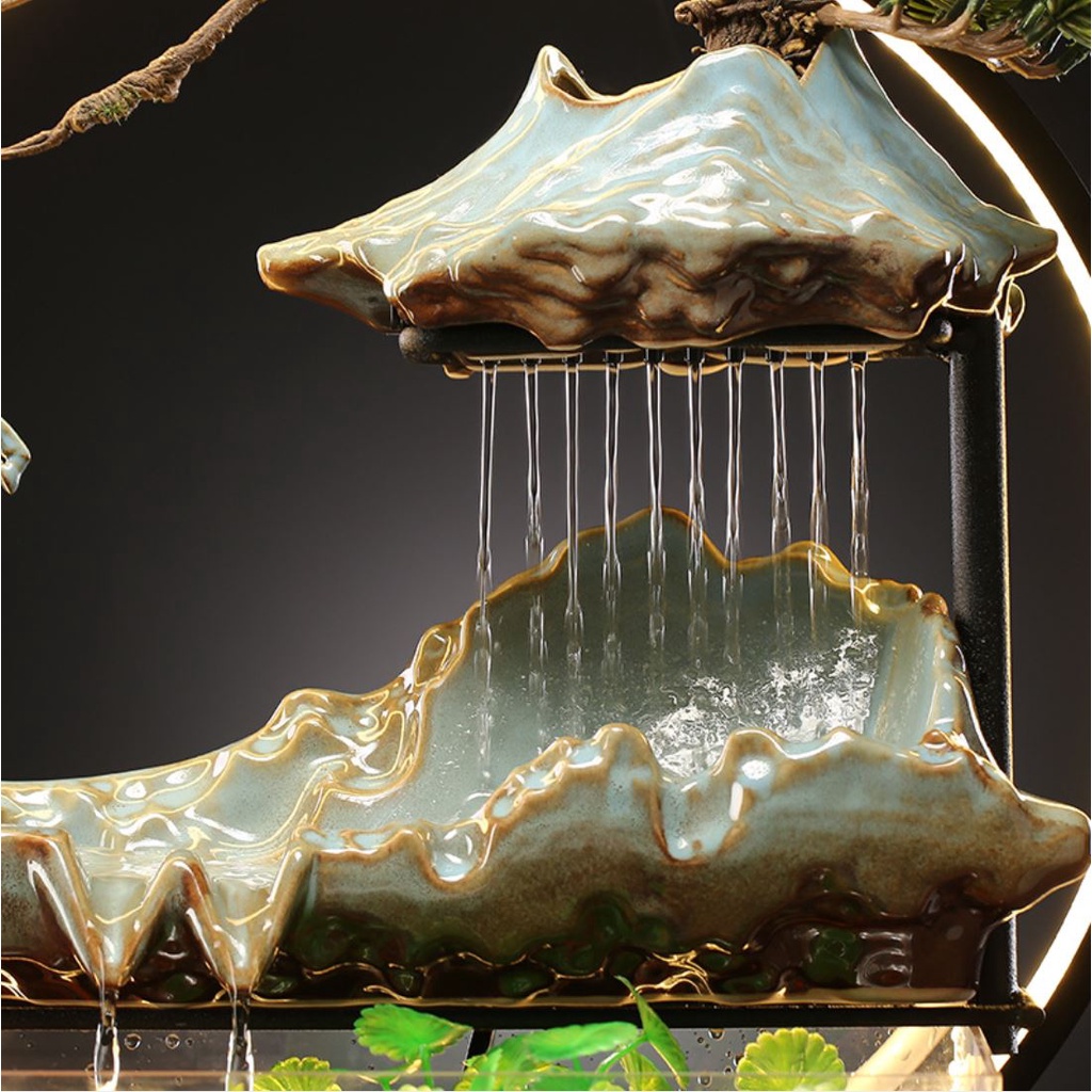 thác nước phong thủy kết hợp bể cả. bể cá tiểu cảnh phong thủy cao cấp