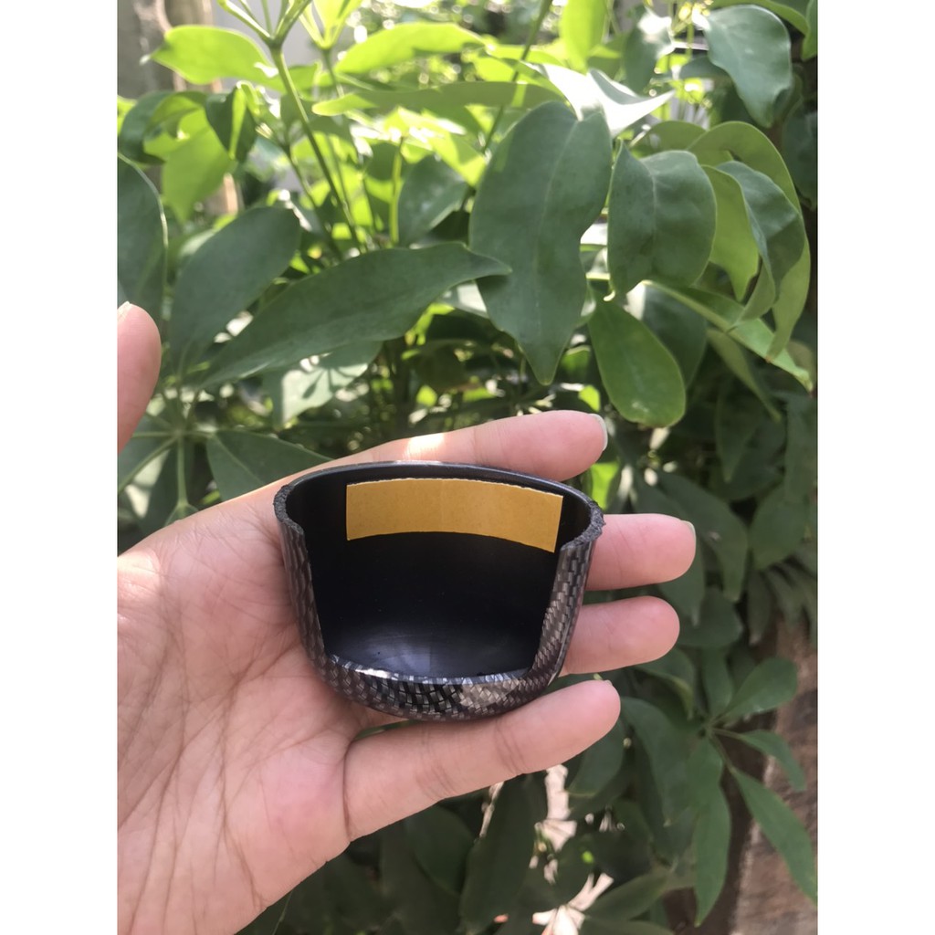 Ốp /chụp đèn soi biển số xe Exciter 150 màu Cacbon.