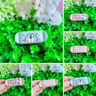 Kẹp giữ phích cắm Hello Kitty - Doremon Doraemon