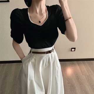 Aó ngắn tay cổ vuông tay bồng viền ngọc kèm chân váy trắng kèm thắt lưng MORAN